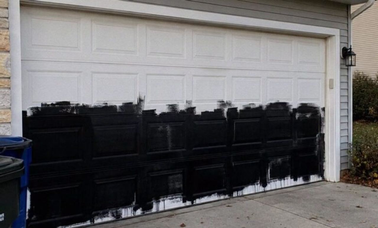 Someone Kept Painting a Woman’s Garage Door Black Every Night – She Assumed It Was Some Kid’s Prank Until She Installed 